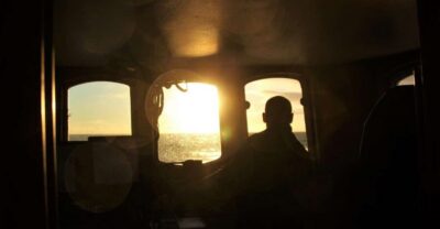Akureyri: Whale Watching in the Midnight Sun - The boat experience: heated inside, open-air platforms, and thermal overalls