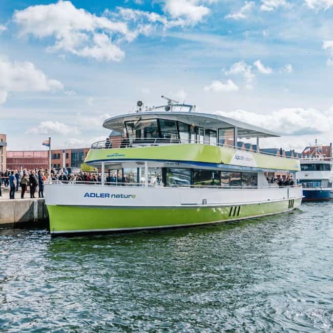Wismar: Electric Boat Tour past Whale Island with Poel Stop - Crossing the Bay of Wismar: ports, terminals, and real-coast views